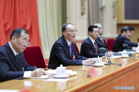 Wang Qishan (2nd L), a member of the Standing Committee of the Political Bureau of the Communist Party of China (CPC) Central Committee and secretary of the CPC Central Commission for Discipline Inspection (CCDI), addresses the Eighth Plenary Session of the 18th CCDI of the CPC in Beijing, capital of China, Oct. 9, 2017. (Xinhua/Ding Lin) Wang Qishan (2nd L), a member of the Standing Committee of the Political Bureau of the Communist Party of China (CPC) Central Committee and secretary of the CPC Central Commission for Discipline Inspection (CCDI), addresses the Eighth Plenary Session of the 18th CCDI of the CPC in Beijing, capital of China, Oct. 9, 2017. (Xinhua/Ding Lin)