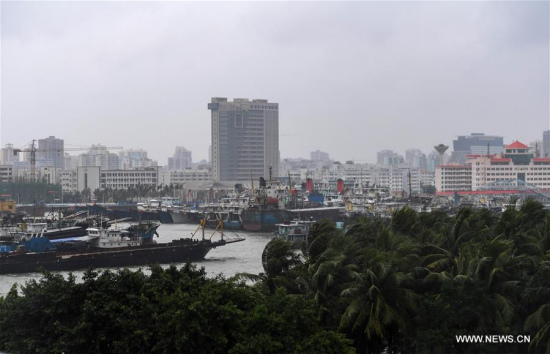 Fishing boats dock at a port of Haikou, south China's Hainan Province, Oct. 15, 2017. This year's 20th typhoon, Khanun, is expected to make landfall between Zhanjiang of Guangdong province and Wenchang of Hainan province, bringing rough gales and heavy storms. (Xinhua/Yang Guanyu) Fishing boats dock at a port of Haikou, south China's Hainan Province, Oct. 15, 2017. This year's 20th typhoon, Khanun, is expected to make landfall between Zhanjiang of Guangdong province and Wenchang of Hainan province, bringing rough gales and heavy storms. (Xinhua/Yang Guanyu)
