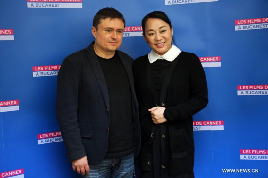 Romanian director Cristian Mungiu (L), three times winner of Cannes prizes and president of the 2017 Shanghai International Film Festival, poses for a photograph with Sun Peng, Chairwoman and CEO of Zhejiang Roc Picture and the producer of The Chinese Widow, during the 8th edition of the film festival entitled Les Films de Cannes a Bucharest (Cannes Film Festival in Bucharest) at a cinema in Bucharest, capital of Romania, on Oct. 14, 2017. Romanian director Cristian Mungiu (L), three times winner of Cannes prizes and president of the 2017 Shanghai International Film Festival, poses for a photograph with Sun Peng, Chairwoman and CEO of Zhejiang Roc Picture and the producer of The Chinese Widow, during the 8th edition of the film festival entitled Les Films de Cannes a Bucharest (Cannes Film Festival in Bucharest) at a cinema in Bucharest, capital of Romania, on Oct. 14, 2017.