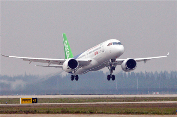 The COMAC C919, China's first domestically produced large passenger aircraft, made its maiden flight at Shanghai Pudong International Airport in May. (Photo/Xinhua) The COMAC C919, China's first domestically produced large passenger aircraft, made its maiden flight at Shanghai Pudong International Airport in May. (Photo/Xinhua)