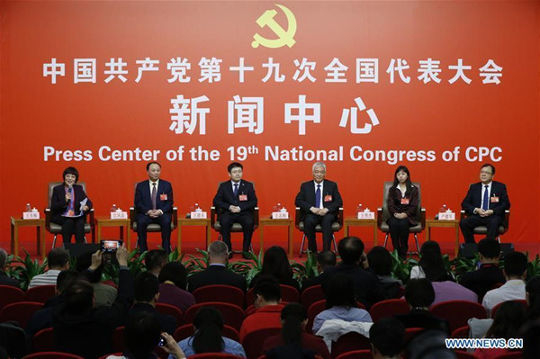The press center of the 19th National Congress of the Communist Party of China (CPC) holds a group interview on implementing the strategy of innovation-driven development in Beijing, capital of China, Oct. 20, 2017. Wang Zhigang (3rd R), Vice Minister of Science and Technology and secretary of the leading Party group within the ministry, Wang Xiujie (2nd R), director of the Center of Molecular Systems Biology of the Institute of Genetics and Developmental Biology (IGDB) of the Chinese Academy of Sciences (CAS), Wang Endong (3rd L), chief scientist of the Inspur Group and an academician of the Chinese Academy of Engineering, Lu Jianjun (1st R), secretary of the Working Committee on Science and Technology of the CPC Shaanxi Provincial Committee and head of the Shaanxi Science and Technology Department, and Jiang Fengyi (2nd L), vice president of Nanchang University, received the group interview. (Xinhua/Shen Bohan) The press center of the 19th National Congress of the Communist Party of China (CPC) holds a group interview on implementing the strategy of innovation-driven development in Beijing, capital of China, Oct. 20, 2017. Wang Zhigang (3rd R), Vice Minister of Science and Technology and secretary of the leading Party group within the ministry, Wang Xiujie (2nd R), director of the Center of Molecular Systems Biology of the Institute of Genetics and Developmental Biology (IGDB) of the Chinese Academy of Sciences (CAS), Wang Endong (3rd L), chief scientist of the Inspur Group and an academician of the Chinese Academy of Engineering, Lu Jianjun (1st R), secretary of the Working Committee on Science and Technology of the CPC Shaanxi Provincial Committee and head of the Shaanxi Science and Technology Department, and Jiang Fengyi (2nd L), vice president of Nanchang University, received the group interview. (Xinhua/Shen Bohan)