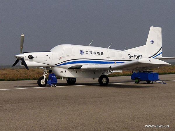 China's heaviest cargo unmanned aerial vehicle (UAV) AT200 prepares for its maiden flight in Neifu Airport in Pucheng, northwest China's Shaanxi Province, Oct. 26, 2017. China's heaviest cargo unmanned aerial vehicle (UAV) completed its maiden flight in northwest China's Shaanxi Province Thursday. With a maximum take-off weight of around 3.4 tonnes and a payload of 1.5 tonnes, the AT200 could be one of the world's most powerful civilian UAVs. (Xinhua) China's heaviest cargo unmanned aerial vehicle (UAV) AT200 prepares for its maiden flight in Neifu Airport in Pucheng, northwest China's Shaanxi Province, Oct. 26, 2017. China's heaviest cargo unmanned aerial vehicle (UAV) completed its maiden flight in northwest China's Shaanxi Province Thursday. With a maximum take-off weight of around 3.4 tonnes and a payload of 1.5 tonnes, the AT200 could be one of the world's most powerful civilian UAVs. (Xinhua)