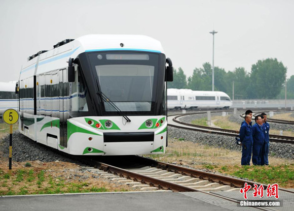A China-made tram powered by hydrogen fuel cells rolls off the production line in Tangshan, Hebei Province, April 27, 2016. (File photo/Chinanews.com) A China-made tram powered by hydrogen fuel cells rolls off the production line in Tangshan, Hebei Province, April 27, 2016. (File photo/Chinanews.com)