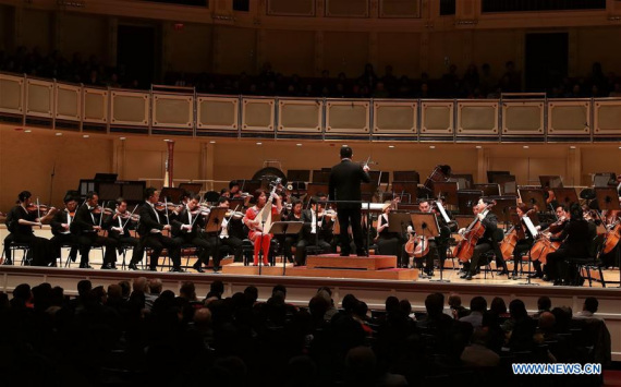 Members of the China National Center for the Performing Arts (NCPA) Orchestra perfom at the Symphony Center in Chicago, the United States, Oct. 28, 2017. A sold-out concert performed here Saturday by China NCPA Orchestra caught the attention of the whole audience by showcasing a unique combination of Western and Chinese music.(Xinhua/Wang Ping) Members of the China National Center for the Performing Arts (NCPA) Orchestra perfom at the Symphony Center in Chicago, the United States, Oct. 28, 2017. A sold-out concert performed here Saturday by China NCPA Orchestra caught the attention of the whole audience by showcasing a unique combination of Western and Chinese music.(Xinhua/Wang Ping)