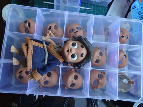 A puppet and its facial models used in the series (Photo/Courtesy of Wang Donglei) A puppet and its facial models used in the series (Photo/Courtesy of Wang Donglei)