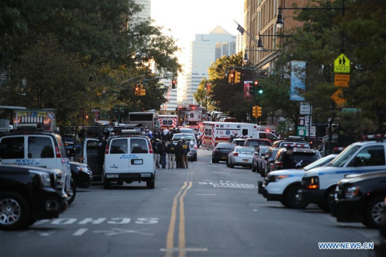 Police vehicles and ambulances are seen near the site of an attack in lower Manhattan in New York, the United States, on Oct. 31, 2017. (Xinhua/Wang Ying) Police vehicles and ambulances are seen near the site of an attack in lower Manhattan in New York, the United States, on Oct. 31, 2017. (Xinhua/Wang Ying)