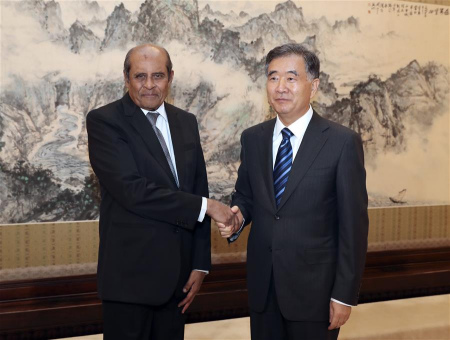 Chinese Vice Premier Wang Yang (R), also member of the Standing Committee of the Political Bureau of the Communist Party of China (CPC) Central Committee, meets with visiting Sri Lankan Foreign Minister Tilak Marapana in Beijing, capital of China, Nov. 1, 2017. (Xinhua/Ma Zhancheng) Chinese Vice Premier Wang Yang (R), also member of the Standing Committee of the Political Bureau of the Communist Party of China (CPC) Central Committee, meets with visiting Sri Lankan Foreign Minister Tilak Marapana in Beijing, capital of China, Nov. 1, 2017. (Xinhua/Ma Zhancheng)