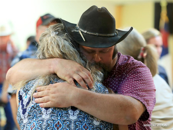 A memorial service is held for the victims of a mass shooting in Sutherland Springs of the U.S. state of Texas Nov. 6, 2017. At least 26 people were killed and many others wounded in Texas' deadliest shooting Sunday morning at a church in Sutherland Springs. (Xinhua/Li Ying) A memorial service is held for the victims of a mass shooting in Sutherland Springs of the U.S. state of Texas Nov. 6, 2017. At least 26 people were killed and many others wounded in Texas' deadliest shooting Sunday morning at a church in Sutherland Springs. (Xinhua/Li Ying)