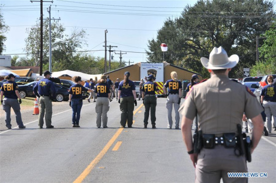 FBI agents search for evidence near the church where a mass shooting occurred in Sutherland Springs, Texas, the United States, Nov. 6, 2017. (Xinhua/Liu Liwei) FBI agents search for evidence near the church where a mass shooting occurred in Sutherland Springs, Texas, the United States, Nov. 6, 2017. (Xinhua/Liu Liwei)