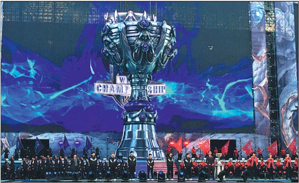 E-sports players pose on stage at the League of Legends World Championship at Bird's Nest stadium in Beijing on Saturday-the first time China has hosted the premier gaming tournament. The Samsung Galaxy team defeated SK Telecom T1 3-0 in an all-Korean final to lift the trophy. (Photo provided to China Daily) E-sports players pose on stage at the League of Legends World Championship at Bird's Nest stadium in Beijing on Saturday-the first time China has hosted the premier gaming tournament. The Samsung Galaxy team defeated SK Telecom T1 3-0 in an all-Korean final to lift the trophy. (Photo provided to China Daily)