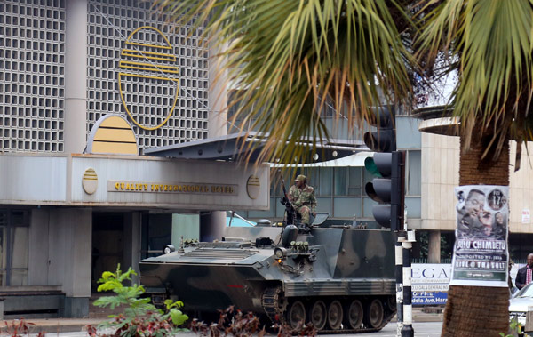 An armored personnel carrier patrols the streets of Harare, capital of Zimbabwe, on Wednesday. China's Foreign Ministry has said it is monitoring the situation.(Photo/Xinhua) An armored personnel carrier patrols the streets of Harare, capital of Zimbabwe, on Wednesday. China's Foreign Ministry has said it is monitoring the situation.(Photo/Xinhua)