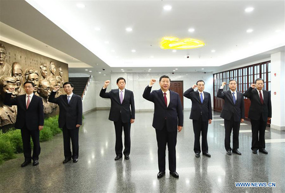 Xi Jinping leads other members of the Standing Committee of the Political Bureau of the Communist Party of China (CPC) Central Committee to review the oath of the CPC when visiting the site where the first CPC National Congress was held in 1921, in Shanghai, east China, Oct. 31, 2017. (Xinhua/Lan Hongguang) Xi Jinping leads other members of the Standing Committee of the Political Bureau of the Communist Party of China (CPC) Central Committee to review the oath of the CPC when visiting the site where the first CPC National Congress was held in 1921, in Shanghai, east China, Oct. 31, 2017. (Xinhua/Lan Hongguang)