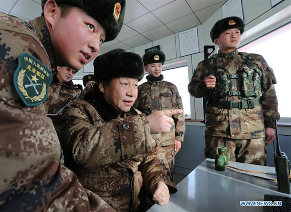 Xi Jinping visits soldiers on duty at a border post in north China's Inner Mongolia Autonomous Region, Jan. 26, 2014. Today, I shall keep watch together with you, Xi told the soldiers. (Xinhua/Li Gang) Xi Jinping visits soldiers on duty at a border post in north China's Inner Mongolia Autonomous Region, Jan. 26, 2014. Today, I shall keep watch together with you, Xi told the soldiers. (Xinhua/Li Gang)