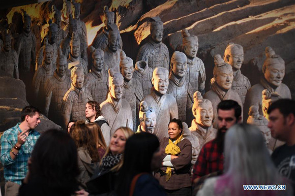 People wait to view terracotta warriors during a press preview at the Virginia Museum of Fine Arts (VMFA) in Richmond, Virginia, the United States, on Nov. 15, 2017. Titled Terracotta Army: Legacy of the First Emperor of China, the exhibition features more than 130 artifacts, including 10 life-size terracotta warriors. The exhibition will be at VMFA from Nov. 18 to March 11, 2018. (Xinhua/Yin Bogu) People wait to view terracotta warriors during a press preview at the Virginia Museum of Fine Arts (VMFA) in Richmond, Virginia, the United States, on Nov. 15, 2017. Titled Terracotta Army: Legacy of the First Emperor of China, the exhibition features more than 130 artifacts, including 10 life-size terracotta warriors. The exhibition will be at VMFA from Nov. 18 to March 11, 2018. (Xinhua/Yin Bogu)