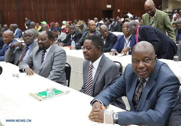 Members of Zimbabwe's ruling Zanu-PF party central committee attend a special meeting in Harare, capital of Zimbabwe, Nov. 19, 2017. Zimbabwe's ruling Zanu-PF party on Sunday recalled President Robert Mugabe from position of party leader, saying he must resign as president by noon Monday or impeachment proceedings will start. (Xinhua/Shaun Jusa) Members of Zimbabwe's ruling Zanu-PF party central committee attend a special meeting in Harare, capital of Zimbabwe, Nov. 19, 2017. Zimbabwe's ruling Zanu-PF party on Sunday recalled President Robert Mugabe from position of party leader, saying he must resign as president by noon Monday or impeachment proceedings will start. (Xinhua/Shaun Jusa)