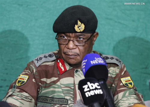 Zimbabwe Defense Forces Chief Constantino Chiwenga speaks in a press conference in Harare, Zimbabwe, on Nov. 20, 2017. Zimbabwean President Robert Mugabe has opened discussions with former Vice President Emmerson Mnangagwa who he fired two weeks ago, Constantino Chiwenga said Monday. (Xinhua/Shaun Jusa) Zimbabwe Defense Forces Chief Constantino Chiwenga speaks in a press conference in Harare, Zimbabwe, on Nov. 20, 2017. Zimbabwean President Robert Mugabe has opened discussions with former Vice President Emmerson Mnangagwa who he fired two weeks ago, Constantino Chiwenga said Monday. (Xinhua/Shaun Jusa)