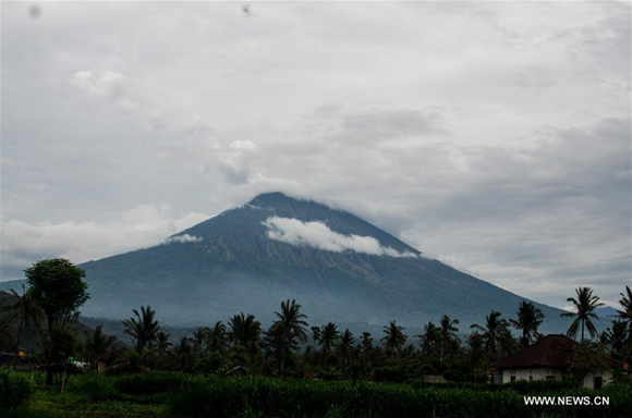 Mount Agung volcano is seen in Bali resort island of Indonesia on Nov. 22, 2017. Mount Agung volcano in Bali resort island of Indonesia erupted on Tuesday, spewing a column of ashes up to the sky, a disaster agency official said. (Xinhua/Muhammad Fauzy Chaniago) Mount Agung volcano is seen in Bali resort island of Indonesia on Nov. 22, 2017. Mount Agung volcano in Bali resort island of Indonesia erupted on Tuesday, spewing a column of ashes up to the sky, a disaster agency official said. (Xinhua/Muhammad Fauzy Chaniago)
