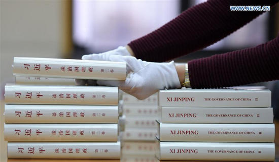 A worker from the Foreign Languages Press puts the second volume of Chinese President Xi Jinping's book Xi Jinping: The Governance of China in order, in Beijing, capital of China, Nov. 7, 2017. (Xinhua/Chen Yehua) A worker from the Foreign Languages Press puts the second volume of Chinese President Xi Jinping's book Xi Jinping: The Governance of China in order, in Beijing, capital of China, Nov. 7, 2017. (Xinhua/Chen Yehua)
