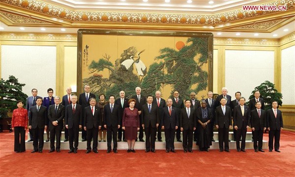 Chinese President Xi Jinping (8th L front) poses for a group photo with foreign delegates attending the 2017 Imperial Springs International Forum before their meeting in Beijing, capital of China, Nov. 30, 2017. (Xinhua/Yao Dawei) Chinese President Xi Jinping (8th L front) poses for a group photo with foreign delegates attending the 2017 Imperial Springs International Forum before their meeting in Beijing, capital of China, Nov. 30, 2017. (Xinhua/Yao Dawei)