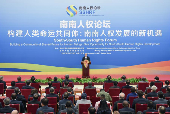 Huang Kunming, a member of the Political Bureau of the Central Committee of the Communist Party of China (CPC) and head of the Publicity Department of the CPC Central Committee, addresses the opening ceremony of the South-South Human Rights Forum in Beijing, Dec 7, 2017. (Photo/Xinhua)