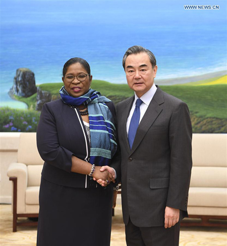 Chinese Foreign Minister Wang Yi (R) meets with Suriname Foreign Minister Yldiz Pollack-Beighle, who is here to attend the first South-South Human Rights Forum, in Beijing, capital of China, Dec. 7, 2017. (Xinhua/Zhang Ling) Chinese Foreign Minister Wang Yi (R) meets with Suriname Foreign Minister Yldiz Pollack-Beighle, who is here to attend the first South-South Human Rights Forum, in Beijing, capital of China, Dec. 7, 2017. (Xinhua/Zhang Ling)
