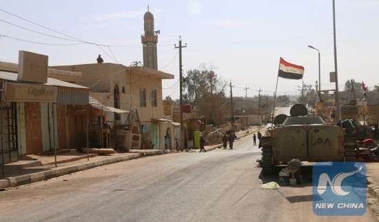 A military vehicle is seen inside the liberated city of Rawa near the Iraqi border with Syria, on Nov. 18, 2017. Iraqi security forces battling Islamic State (IS) militants freed Friday the city of Rawa near the border with Syria, dislodging the extremist militants from their last urban stronghold in Iraq, the Iraqi military said. (Xinhua Photo) A military vehicle is seen inside the liberated city of Rawa near the Iraqi border with Syria, on Nov. 18, 2017. Iraqi security forces battling Islamic State (IS) militants freed Friday the city of Rawa near the border with Syria, dislodging the extremist militants from their last urban stronghold in Iraq, the Iraqi military said. (Xinhua Photo)