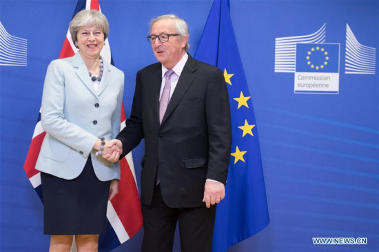 European Commission President Jean-Claude Juncker (R) meets with British Prime Minister Theresa May in Brussels, Belgium, Dec. 8, 2017. (Xinhua/The European Union) European Commission President Jean-Claude Juncker (R) meets with British Prime Minister Theresa May in Brussels, Belgium, Dec. 8, 2017. (Xinhua/The European Union)