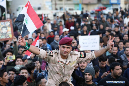 People celebrate the victory of the war against the Islamic State (IS) on Tahrir Square, Baghdad, Iraq, on Dec. 10, 2017. Iraqi Prime Minister Haider al-Abadi on Saturday officially declared full liberation of Iraq from the Islamic State militants after Iraqi forces recaptured all the areas once seized by the extremist group. (Xinhua/Khalil Dawood) People celebrate the victory of the war against the Islamic State (IS) on Tahrir Square, Baghdad, Iraq, on Dec. 10, 2017. Iraqi Prime Minister Haider al-Abadi on Saturday officially declared full liberation of Iraq from the Islamic State militants after Iraqi forces recaptured all the areas once seized by the extremist group. (Xinhua/Khalil Dawood)