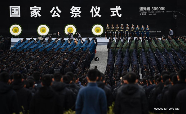 Photo taken on Dec. 13, 2017 shows the scene of state memorial ceremony for China's National Memorial Day for Nanjing Massacre Victims at the memorial hall for the massacre victims in Nanjing, east China's Jiangsu Province, Dec. 13, 2017. (Xinhua/Han Yuqing) Photo taken on Dec. 13, 2017 shows the scene of state memorial ceremony for China's National Memorial Day for Nanjing Massacre Victims at the memorial hall for the massacre victims in Nanjing, east China's Jiangsu Province, Dec. 13, 2017. (Xinhua/Han Yuqing)
