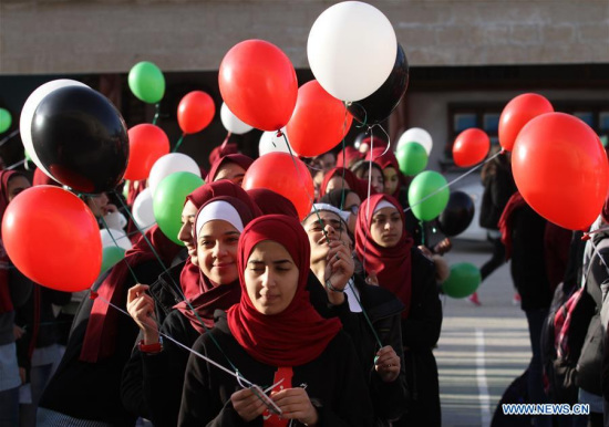 Palestinian students fly balloons as a protest against U.S President Donald Trump's decision to recognize Jerusalem as the capital of Israel, in the West Bank city of Nablus, on Dec. 12, 2017. (Xinhua/Nidal Eshtayeh) Palestinian students fly balloons as a protest against U.S President Donald Trump's decision to recognize Jerusalem as the capital of Israel, in the West Bank city of Nablus, on Dec. 12, 2017. (Xinhua/Nidal Eshtayeh)