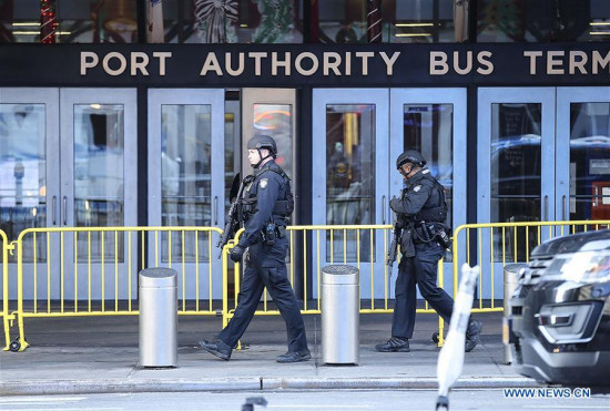 Police officers work near the scene of an explosion in New York City, the United States, on Dec. 11, 2017. Four people were injured in an explosion in a passageway near Times Square, Manhattan in New York City early Monday morning. (Xinhua/Wang Ying) Police officers work near the scene of an explosion in New York City, the United States, on Dec. 11, 2017. Four people were injured in an explosion in a passageway near Times Square, Manhattan in New York City early Monday morning. (Xinhua/Wang Ying)
