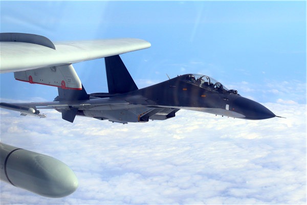 PLA Air Force aircraft conduct a patrol exercise on Monday near Taiwan. The military says such drills are strategically important. (China Daily) PLA Air Force aircraft conduct a patrol exercise on Monday near Taiwan. The military says such drills are strategically important. (China Daily)
