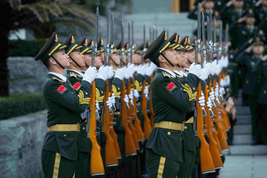 The PLA force stationed in Macao holds flag-rising ceremony to celebrate the 18th anniversary of Macao's return to China. /CGTN Photo The PLA force stationed in Macao holds flag-rising ceremony to celebrate the 18th anniversary of Macao's return to China. /CGTN Photo