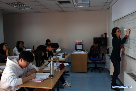 Photo taken on Dec. 15, 2017 shows Chinese students attending a class at the Modern Greek Language Teaching Center of the National University of Athens in Athens, Greece. (Xinhua/Marios Lolos) Photo taken on Dec. 15, 2017 shows Chinese students attending a class at the Modern Greek Language Teaching Center of the National University of Athens in Athens, Greece. (Xinhua/Marios Lolos)