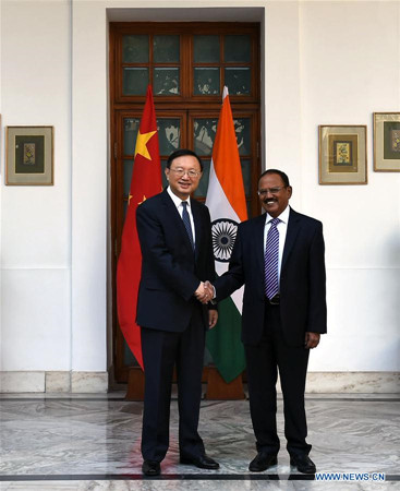 Chinese State Councilor Yang Jiechi (L) shakes hands with Indian National Security Adviser Ajit Doval in New Delhi, India, Dec. 22, 2017. Senior officials of China and India have agreed to properly handle border issues so as to jointly safeguard peace and tranquility in their border areas. (Xinhua/Zhang Naijie) Chinese State Councilor Yang Jiechi (L) shakes hands with Indian National Security Adviser Ajit Doval in New Delhi, India, Dec. 22, 2017. Senior officials of China and India have agreed to properly handle border issues so as to jointly safeguard peace and tranquility in their border areas. (Xinhua/Zhang Naijie)