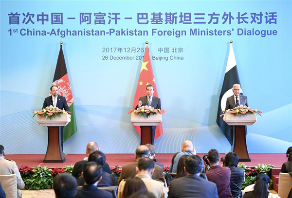 Chinese Foreign Minister Wang Yi (C), Afghan Foreign Minister Salahuddin Rabbani (L) and Pakistani Foreign Minister Khawaja Muhammad Asif, meet the press after the 1st China-Afghanistan-Pakistan Foreign Ministers' Dialogue, in Beijing, capital of China, Dec. 26, 2017. (Xinhua/Yan Yan) Chinese Foreign Minister Wang Yi (C), Afghan Foreign Minister Salahuddin Rabbani (L) and Pakistani Foreign Minister Khawaja Muhammad Asif, meet the press after the 1st China-Afghanistan-Pakistan Foreign Ministers' Dialogue, in Beijing, capital of China, Dec. 26, 2017. (Xinhua/Yan Yan)