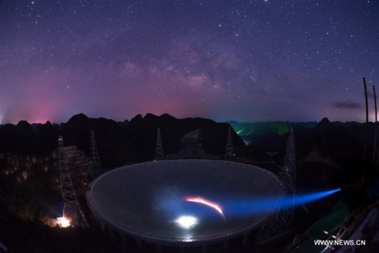 Photo taken on June 27, 2016 shows the Five-hundred-meter Aperture Spherical Telescope (FAST) under the stars in Pingtang County, southwest China's Guizhou Province. (Xinhua/Liu Xu) Photo taken on June 27, 2016 shows the Five-hundred-meter Aperture Spherical Telescope (FAST) under the stars in Pingtang County, southwest China's Guizhou Province. (Xinhua/Liu Xu)