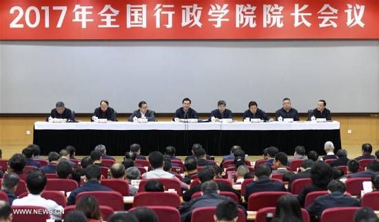 Chinese State Councilor Yang Jing (back, 4th L), who is also head of the Chinese Academy of Governance, addresses a meeting of presidents of governance academies, in Beijing, capital of China, Dec. 26, 2017. (Xinhua/Zhang Ling)