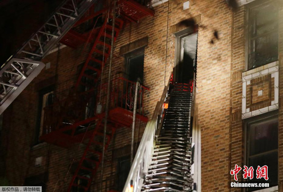 A fire breaks out Thursday evening in the north of New York City, the United States, Dec. 28, 2017. (Photo/Agencies) A fire breaks out Thursday evening in the north of New York City, the United States, Dec. 28, 2017. (Photo/Agencies)