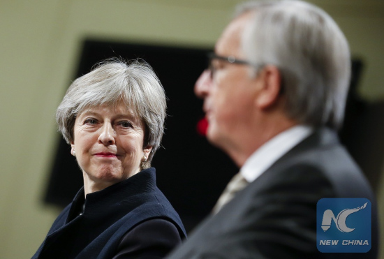 British Prime Minister Theresa May (L) and European Commission President Jean-Claude Juncker attend a press conference after their meeting on Brexit at EU headquarters in Brussels, Belgium, on Dec. 4, 2017. (Xinhua/Ye Pingfan) British Prime Minister Theresa May (L) and European Commission President Jean-Claude Juncker attend a press conference after their meeting on Brexit at EU headquarters in Brussels, Belgium, on Dec. 4, 2017. (Xinhua/Ye Pingfan)