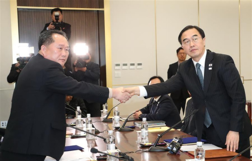 Ri Son-gwon (R), chairman of the Committee for the Peaceful Reunification of the Fatherland of the Democratic People's Republic of Korea (DPRK), shakes hands with South Korean Unification Minister Cho Myoung-gyon in the truce village of Panmunjom, Jan. 9, 2018. South Korea and the DPRK on Tuesday kicked off a senior-level, inter-governmental dialogue in the truce village of Panmunjom. (Xinhua/Newsis) Ri Son-gwon (R), chairman of the Committee for the Peaceful Reunification of the Fatherland of the Democratic People's Republic of Korea (DPRK), shakes hands with South Korean Unification Minister Cho Myoung-gyon in the truce village of Panmunjom, Jan. 9, 2018. South Korea and the DPRK on Tuesday kicked off a senior-level, inter-governmental dialogue in the truce village of Panmunjom. (Xinhua/Newsis)