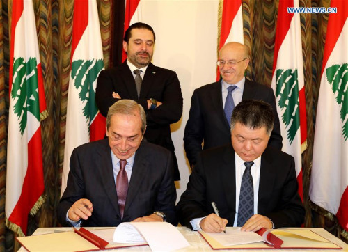 Chinese Ambassador to Lebanon Wang Kejian (R, Front) and Lebanese President of the Council for Development and Reconstruction Nabil El-Jisr (L, Front) sign a project deal in Beirut, Lebanon, on Jan. 9, 2018. The launching ceremony of the Chinese government's funding project to build and equip a new Lebanese National Conservatory of Music was held here on Tuesday. (Xinhua/Dalati & Nohra) Chinese Ambassador to Lebanon Wang Kejian (R, Front) and Lebanese President of the Council for Development and Reconstruction Nabil El-Jisr (L, Front) sign a project deal in Beirut, Lebanon, on Jan. 9, 2018. The launching ceremony of the Chinese government's funding project to build and equip a new Lebanese National Conservatory of Music was held here on Tuesday. (Xinhua/Dalati & Nohra)