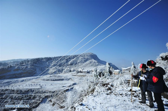 Staff members of Wuchuan Power Supply Bureau check supply lines in Wuchuan Gelao and Miao Autonomous County, southwest China's Guizhou Province, Jan. 9, 2018. (Xinhua/Tao Liang) Staff members of Wuchuan Power Supply Bureau check supply lines in Wuchuan Gelao and Miao Autonomous County, southwest China's Guizhou Province, Jan. 9, 2018. (Xinhua/Tao Liang)