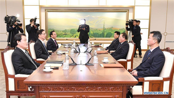 South Korean delegation (L) and the Democratic People's Republic of Korea (DPRK) delegation hold talks at the truce village of Panmunjom, Jan. 17, 2018. (Xinhua/South Korean Unification Ministry) South Korean delegation (L) and the Democratic People's Republic of Korea (DPRK) delegation hold talks at the truce village of Panmunjom, Jan. 17, 2018. (Xinhua/South Korean Unification Ministry)