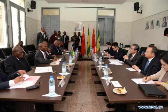 Visiting Chinese Foreign Minister Wang Yi (3rd R) meets with his Sao Tome and Principe counterpart Urbino Botelho (2nd L, front) in Sao Tome, capital of Sao Tome and Principe, Jan. 15, 2018. (Xinhua/Qiao Benxiao) Visiting Chinese Foreign Minister Wang Yi (3rd R) meets with his Sao Tome and Principe counterpart Urbino Botelho (2nd L, front) in Sao Tome, capital of Sao Tome and Principe, Jan. 15, 2018. (Xinhua/Qiao Benxiao)