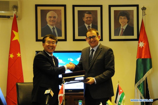 Chinese Ambassador to Jordan Pan Weifang (L) shakes hands with Haitham Misto, chief commissioner of the Civil Aviation Regulatory Commission in Jordan, in Amman, Jordan, on Jan. 15, 2018. (Xinhua/Lin Xiaowei Chinese Ambassador to Jordan Pan Weifang (L) shakes hands with Haitham Misto, chief commissioner of the Civil Aviation Regulatory Commission in Jordan, in Amman, Jordan, on Jan. 15, 2018. (Xinhua/Lin Xiaowei