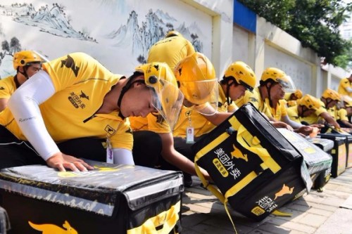 Meituan couriers prepare for food delivery. (Photo/Xinhua) Meituan couriers prepare for food delivery. (Photo/Xinhua)
