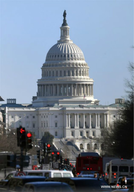 The U.S. Capitol is seen through traffic during rush hour in Washington Jan. 19, 2018. The U.S. government was shutting down as the Senate failed to pass a stopgap spending bill on Friday. (Xinhua/Yin Bogu) The U.S. Capitol is seen through traffic during rush hour in Washington Jan. 19, 2018. The U.S. government was shutting down as the Senate failed to pass a stopgap spending bill on Friday. (Xinhua/Yin Bogu)