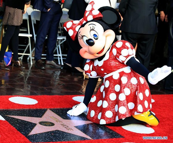 Disney character Minnie Mouse attends a star honoring ceremony on the Hollywood Walk of Fame in Los Angeles, the United States, Jan. 22, 2018. (Photo/Xinhua) Disney character Minnie Mouse attends a star honoring ceremony on the Hollywood Walk of Fame in Los Angeles, the United States, Jan. 22, 2018. (Photo/Xinhua)