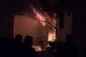 China apartment building fire kills 4, injures 13